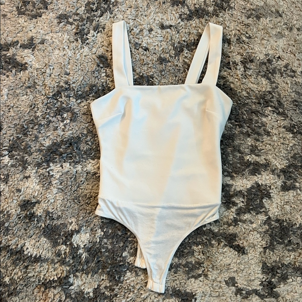 Lulu’s white body suit